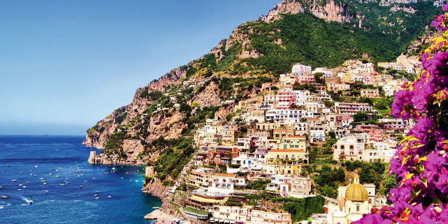 View of the town of Positano with flowers, Amalfi Coast, Italy