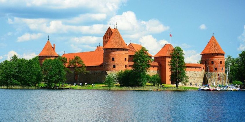 TRAKAI, LITHUANIA - MAY 31: Galves lake,Trakai old red bricks castle view on May 31, 2015, Trakai, Lithuania.