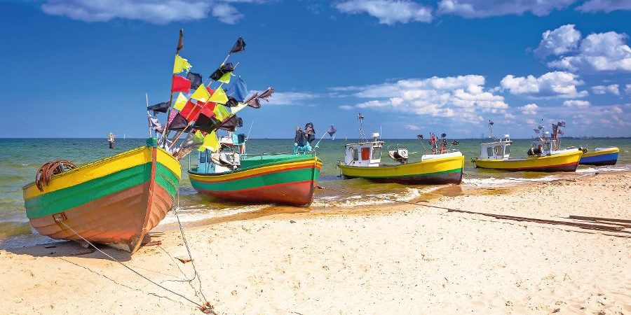 Fishing boats on the beach of Baltic Sea in Poland